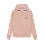Front view of a Fear of God Essentials pullover hoodie in pink.